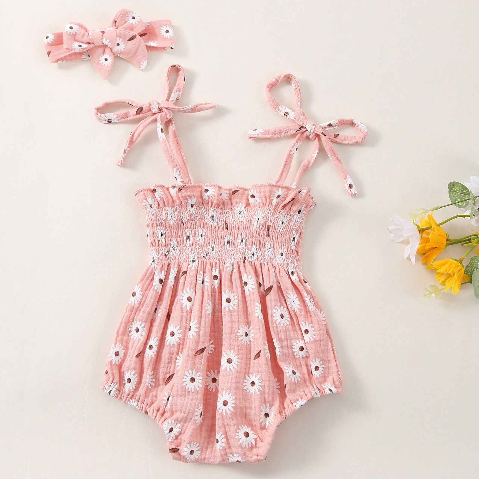 Ruby's Bow Flower Print Short Sleeve Baby Girl Romper — Image 1 | TG Clothing Co. LLC