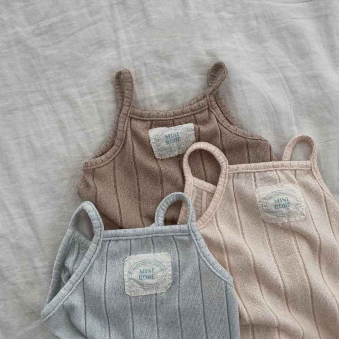 Lila's Newborn Sling Vest Romper — Image 1 | TG Clothing Co. LLC